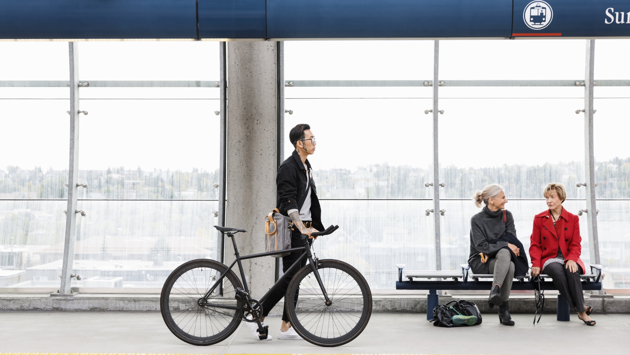 Man with bike at Sunalta Station