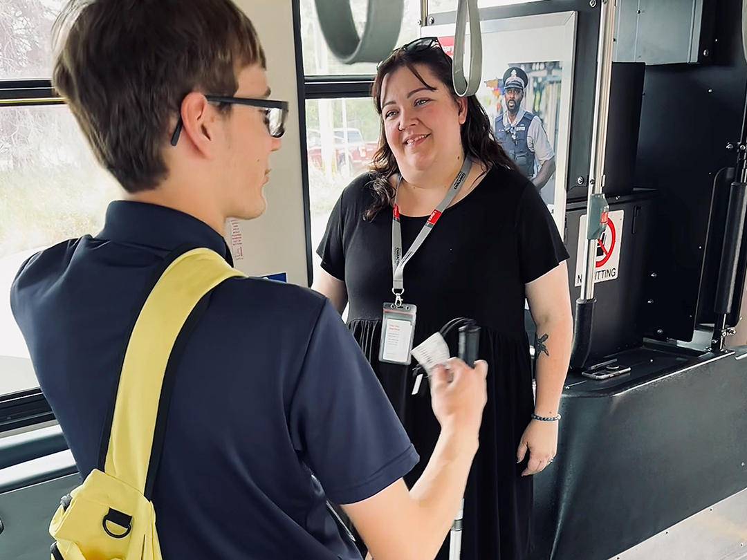 Student with disability speaking with a Travel Trainer
