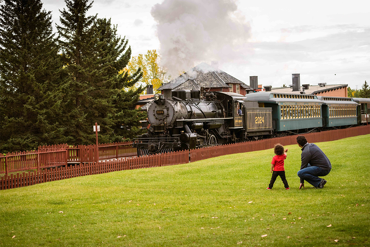 Heritage Park  - family looking at the train